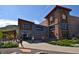 New Terrain Brewing Company building with a stone facade and a welcoming outdoor seating area at 15389 W 50Th Dr, Golden, CO 80403