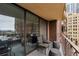 Balcony with a relaxing sitting area perfect for enjoying city views at 1020 15Th St # 9N, Denver, CO 80202