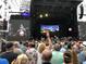Vibrant concert scene with a live band performing on stage, with an energetic crowd enjoying the music and atmosphere at 1020 15Th St # 9N, Denver, CO 80202