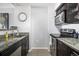 Kitchen featuring granite countertops, sink, and stainless steel oven at 1020 15Th St # 9N, Denver, CO 80202