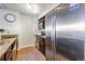 Kitchen featuring stainless steel refrigerator, a sink with granite countertops and stainless steel appliances at 1020 15Th St # 9N, Denver, CO 80202