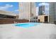 Inviting outdoor pool area with a refreshing pool and a serene surrounding environment at 1020 15Th St # 9N, Denver, CO 80202