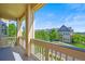 Exterior balcony view showing neighborhood, green trees, and residential buildings at 10241 Bellwether Ln, Lone Tree, CO 80124