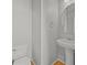 Half bathroom featuring a pedestal sink and a toilet at 10241 Bellwether Ln, Lone Tree, CO 80124