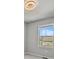 Bright bedroom featuring neutral walls and a window view of neighborhood homes at 10241 Bellwether Ln, Lone Tree, CO 80124