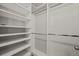 Organized walk-in closet with adjustable shelving and ample storage space at 10241 Bellwether Ln, Lone Tree, CO 80124