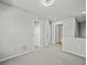 Spacious hallway with neutral paint, carpet, and multiple doors leading to other rooms at 10241 Bellwether Ln, Lone Tree, CO 80124
