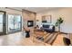 Stylish living room featuring a fireplace, modern decor, and large windows for ample natural light at 1660 Utica St, Denver, CO 80204