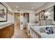 Shared room with hallway access and a large walk-in closet at 6570 Parterre N Pkwy # 2, Thornton, CO 80602
