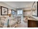 Bright Bedroom with striped accent wall, two cribs, and matching decor at 6570 Parterre N Pkwy # 2, Thornton, CO 80602