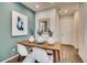 Contemporary dining space with sleek furniture and artistic wall accents at 6570 Parterre N Pkwy # 2, Thornton, CO 80602