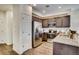 Well-lit kitchen with stainless steel appliances, granite countertops, and ample cabinet space at 6570 Parterre N Pkwy # 2, Thornton, CO 80602