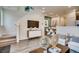 Elegant living area with sophisticated decor and comfortable seating at 6570 Parterre N Pkwy # 2, Thornton, CO 80602