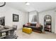 Comfortable home office space with couch, bookcase, and modern workspace at 9158 Martin Luther King Blvd, Denver, CO 80238