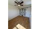 Bedroom featuring light hardwood flooring and modern sliding glass closet doors at 3025 Broadway St # 17, Boulder, CO 80304