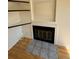 Cozy fireplace with tile surround and wooden mantel, perfect for relaxing evenings at 3025 Broadway St # 17, Boulder, CO 80304