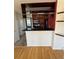 Bright kitchen featuring wooden cabinets, stainless steel appliances, and a breakfast bar at 3025 Broadway St # 17, Boulder, CO 80304