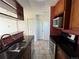 Well-equipped kitchen with stainless appliances, granite counters, and tile flooring at 3025 Broadway St # 17, Boulder, CO 80304