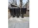 Three black mailboxes are lined up along a sidewalk at 3025 Broadway St # 17, Boulder, CO 80304