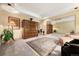 Comfortable bedroom with an armoire, a mirrored closet, and a plush rug at 108 Castle Pines N Dr, Castle Rock, CO 80108