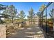 Large deck with glass panels offers stunning views and ample space for outdoor entertaining at 108 Castle Pines N Dr, Castle Rock, CO 80108
