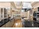 Modern kitchen boasts stainless steel appliances and plenty of counter space at 108 Castle Pines N Dr, Castle Rock, CO 80108
