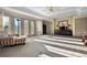 Bright living room with doors to deck, offering comfortable seating and ample natural light at 108 Castle Pines N Dr, Castle Rock, CO 80108