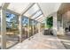 Bright sunroom filled with natural light, offering views of the outdoors at 108 Castle Pines N Dr, Castle Rock, CO 80108