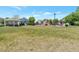 Community park featuring playground equipment, benches, and open green space at 5798 Biscay St, Denver, CO 80249