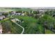 Aerial shot of a vibrant neighborhood park featuring a playground and green space at 2364 Autumn Ridge Blvd, Lafayette, CO 80026