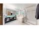 Clean bathroom with double sinks, soaking tub, and glass-enclosed walk-in shower at 2364 Autumn Ridge Blvd, Lafayette, CO 80026