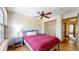 Comfortable bedroom with a ceiling fan and closet space at 2364 Autumn Ridge Blvd, Lafayette, CO 80026
