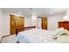 Basement bedroom featuring a wood-trimmed closet and door at 2364 Autumn Ridge Blvd, Lafayette, CO 80026