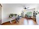 Spacious office with hardwood floors, a ceiling fan, and large windows at 2364 Autumn Ridge Blvd, Lafayette, CO 80026