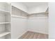 Organized walk-in closet with shelving for ample storage space at 27460 E Cedar Pl, Aurora, CO 80018