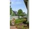 Backyard showcasing a well-maintained lawn and colorful flower garden at 5419 Uinta St, Denver, CO 80238