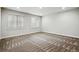 Unfinished basement with plush carpet and white trim at 5419 Uinta St, Denver, CO 80238