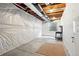 Unfinished basement with exposed ceiling and insulated walls at 5419 Uinta St, Denver, CO 80238