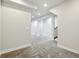 Spacious basement with plush carpet and white trim at 5419 Uinta St, Denver, CO 80238