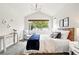 Bright bedroom with vaulted ceilings, large windows, and stylish decor at 5419 Uinta St, Denver, CO 80238