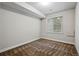 Cozy bedroom with a window and neutral carpeting at 5419 Uinta St, Denver, CO 80238