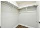 Organized closet with shelves and rods for ample storage at 5419 Uinta St, Denver, CO 80238
