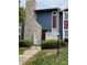 Charming townhouse with stone accents, landscaped front yard, and welcoming curb appeal at 10008 Quivas St, Thornton, CO 80260