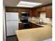 Well-lit kitchen featuring stainless steel appliances, and ample counter space at 10008 Quivas St, Thornton, CO 80260