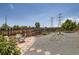 Outdoor patio area offering a tranquil escape with stone pavers, rock landscaping, and a well manicured garden at 3762 S Halifax St, Aurora, CO 80013