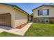 Charming two-story home with green lawn, a walkway to the front door, and a two-car garage at 3762 S Halifax St, Aurora, CO 80013