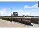 The Olde Town Hub gathering place with brick and stone architecture under a blue sky at 6205 Pierce St, Arvada, CO 80003