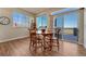 Cozy dining area filled with natural light and views of the outdoor deck at 23593 E Eads Dr, Aurora, CO 80016