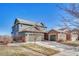 Charming two-story home featuring a three-car garage and well-manicured lawn at 23593 E Eads Dr, Aurora, CO 80016