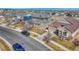 Charming homes with stone accents, well-manicured lawns, and a peaceful street at 23593 E Eads Dr, Aurora, CO 80016